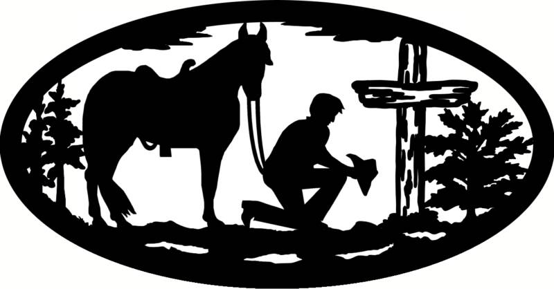 cowboy in prayer at cross